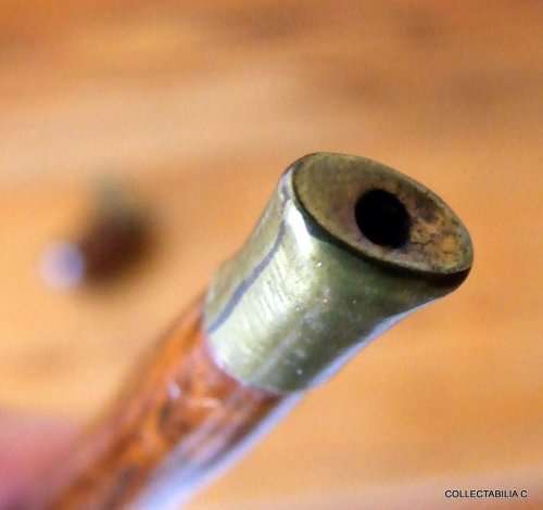 An old wood and brass estate pipe for smoking....whatever!