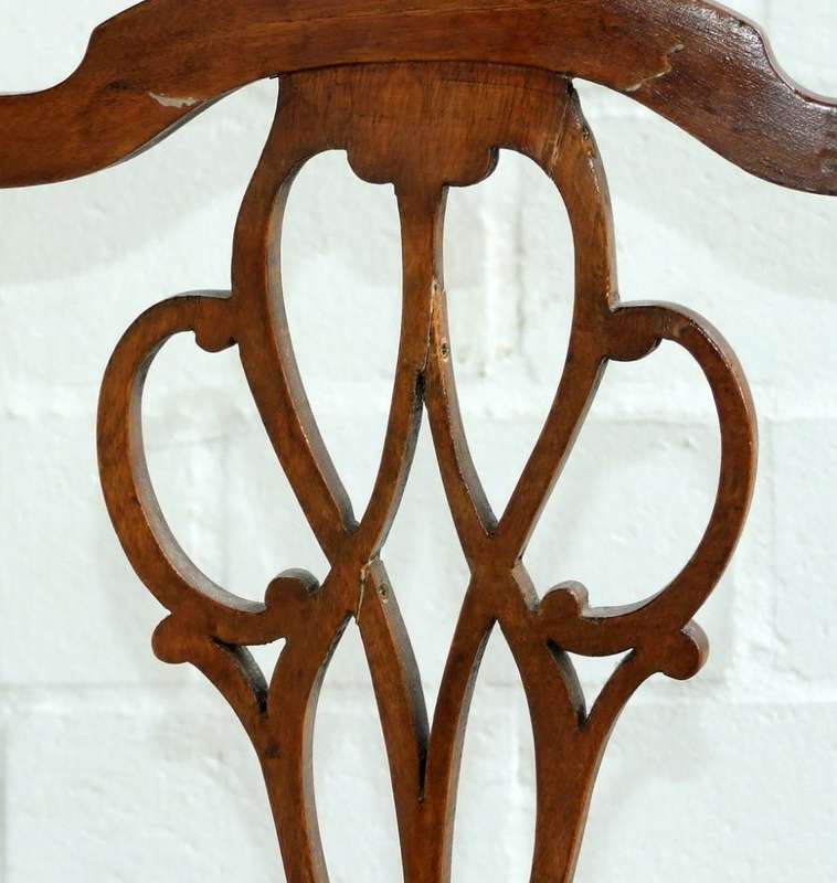 Antique Elbow (Carver) Chair in sturdy condition, fretwork damaged, probably Walnut.