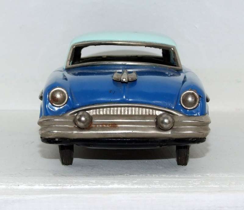 A made in Japan battery operated Tinplate Cadillac car circa 1950