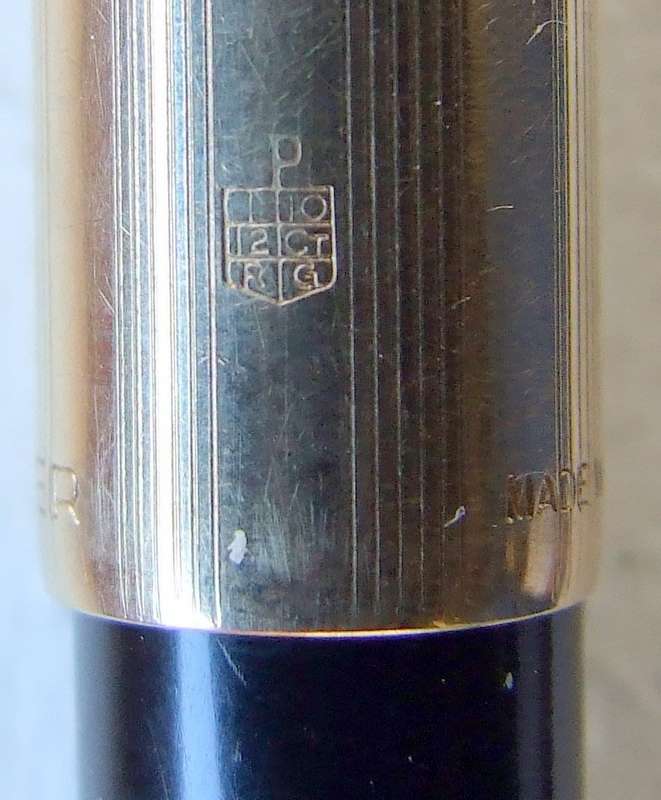 Vintage Boxed Black & Rolled Gold Parker 65 Pen in good working condition.