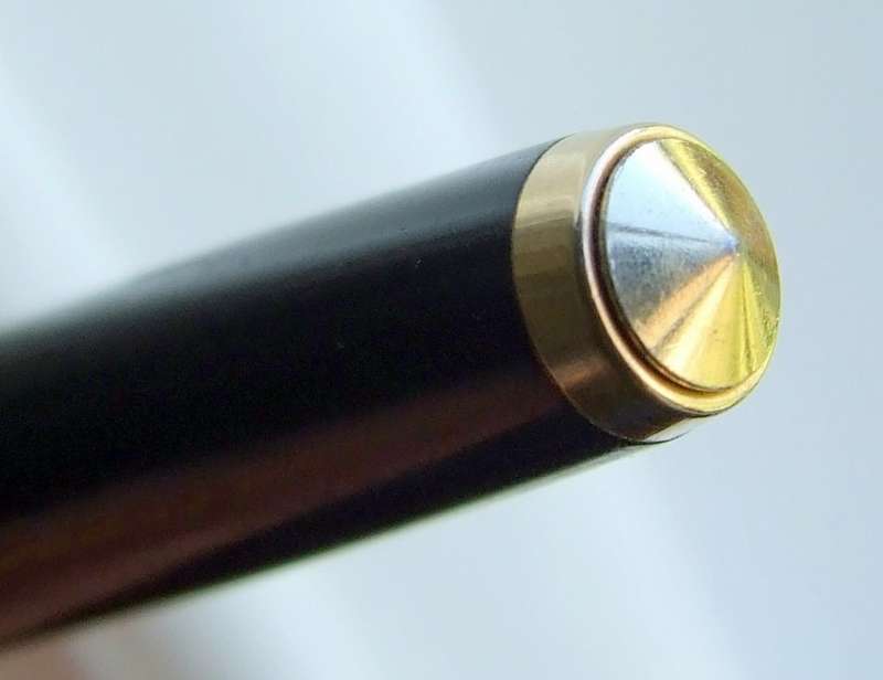 Vintage Boxed Black & Rolled Gold Parker 65 Pen in good working condition.