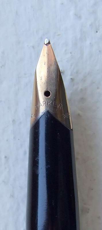 Vintage Boxed Black & Rolled Gold Parker 65 Pen in good working condition.