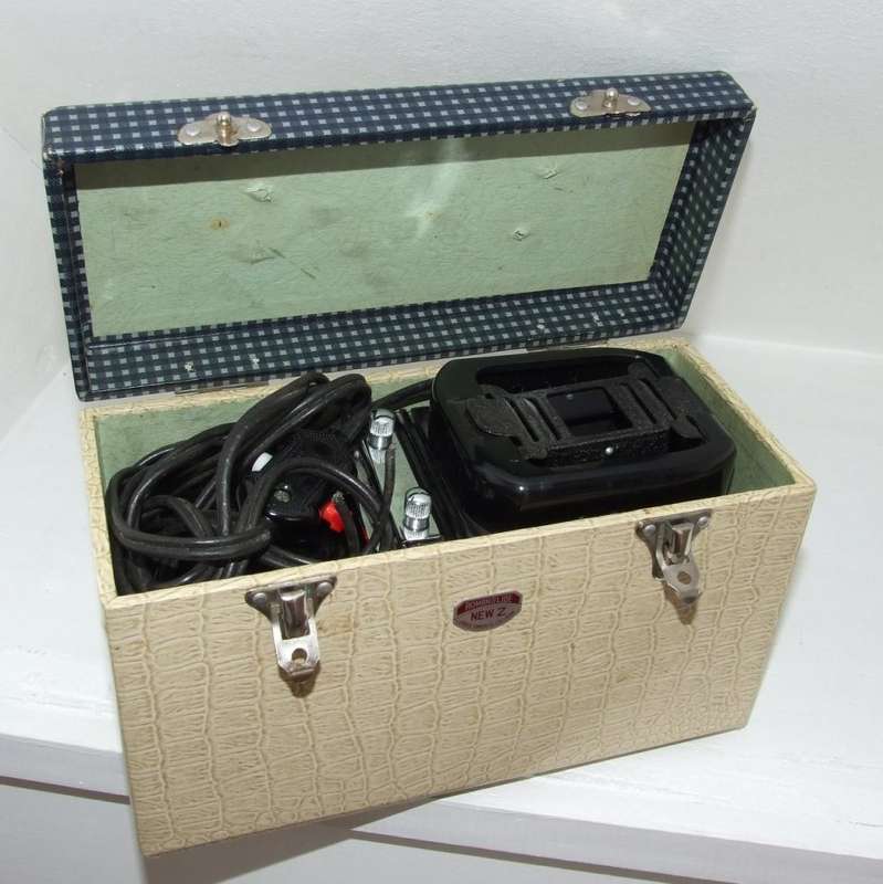 1950's Japanese ROMAN SLIDE NEW Z portable 35mm Slide Projector in original case.