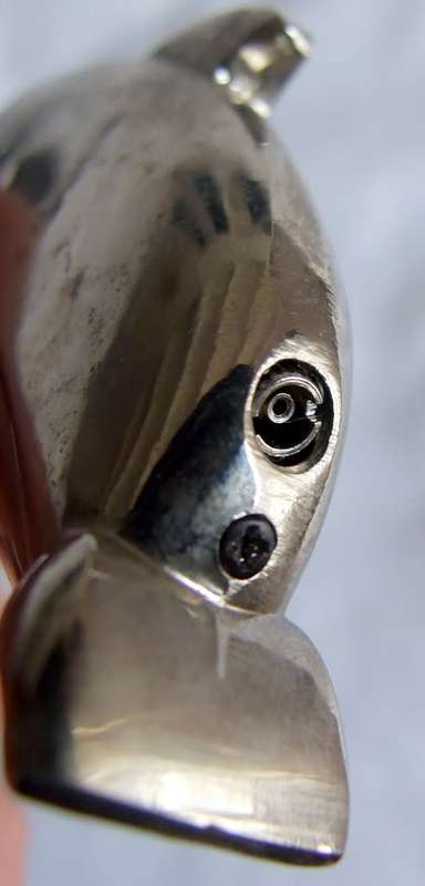 Unusual, hefty (83grams) Piezo Jet dolphin lighter, working.