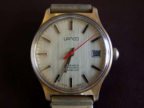 Working gold plated gents LANCO 25 jewel Automatic, date, original Maruman Flex band.