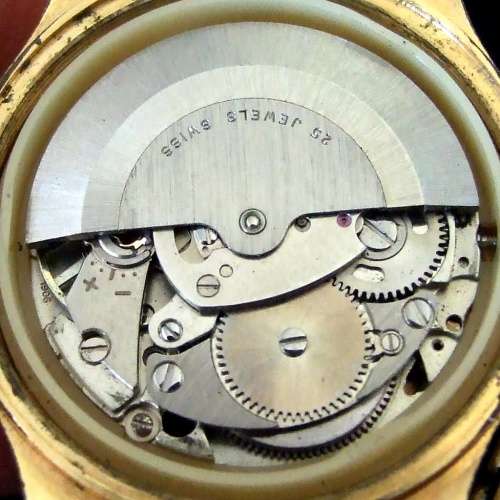 Working gold plated gents LANCO 25 jewel Automatic, date, original Maruman Flex band.