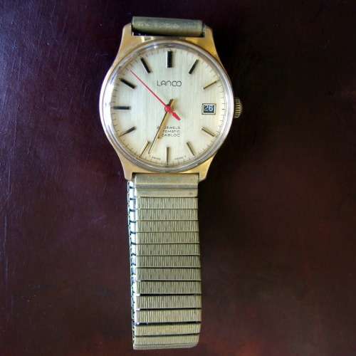 Working gold plated gents LANCO 25 jewel Automatic, date, original Maruman Flex band.