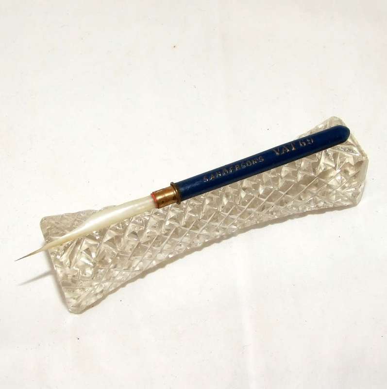 Antique brass and feather quill toothpick advertising Sanderson & Co VAT 69 WHISKY