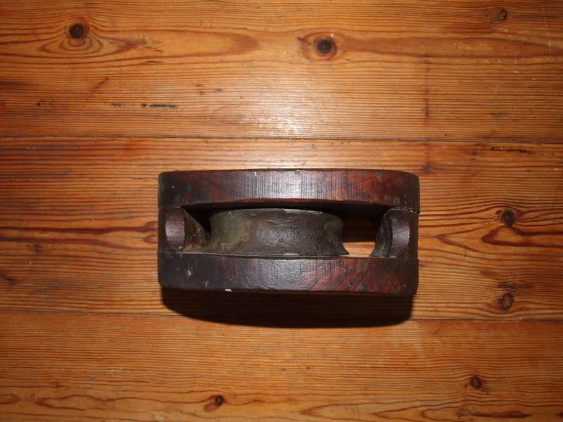 A vintage wood sailing block pulley