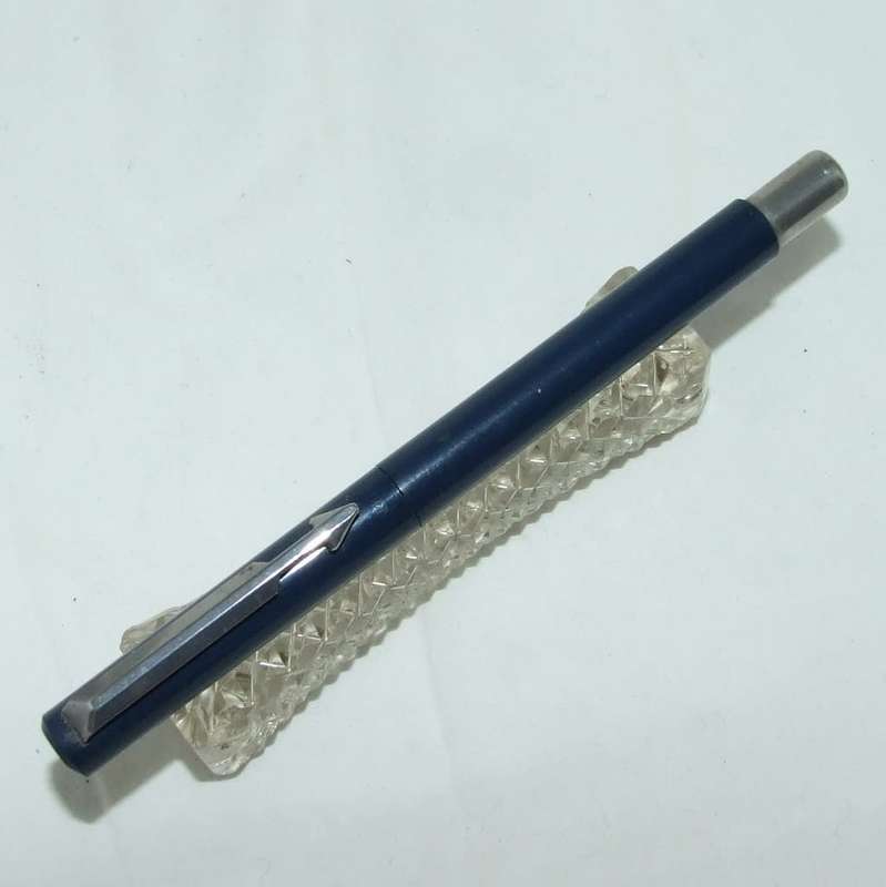 A blue 1993 made in UK PARKER VECTOR ROLLERBALL PEN