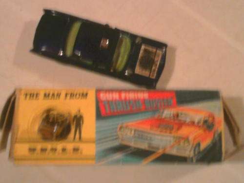 Gorgi cars man from UNCLE driving and firing