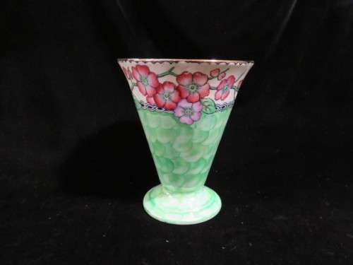 Green Maling porcelain vase with floral design.