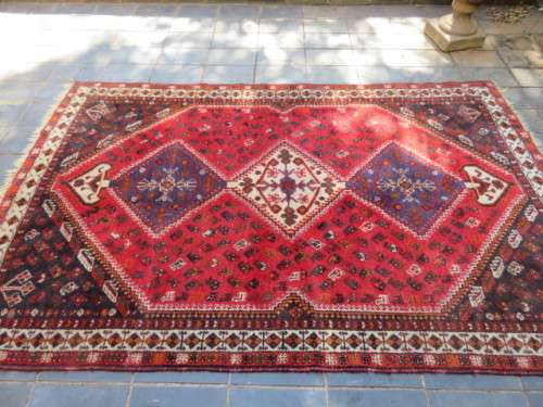 Persian Shiraz hand knotted carpet.