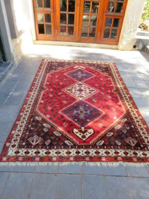 Persian Shiraz hand knotted carpet.