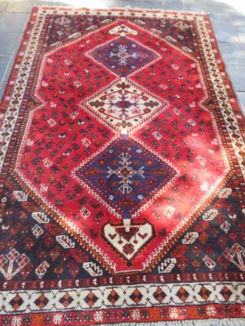 Persian Shiraz hand knotted carpet.