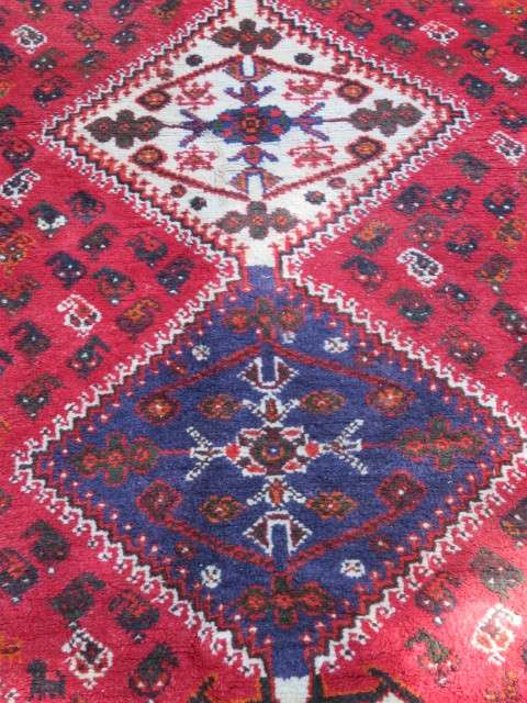Persian Shiraz hand knotted carpet.