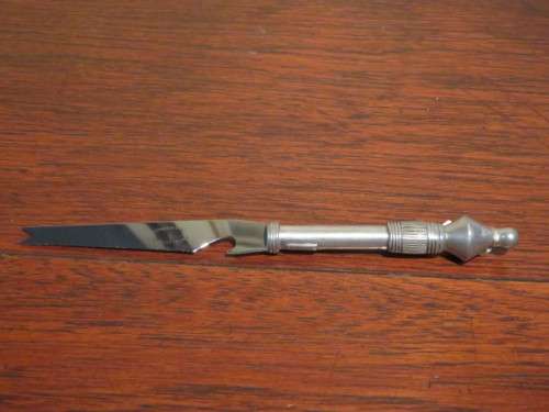 Carol Boyes cheese knife and bottle opener