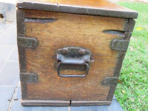 Antique wooden kist with original fittings.