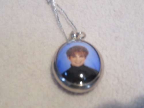 Princess Diana swivelling silver pendant.