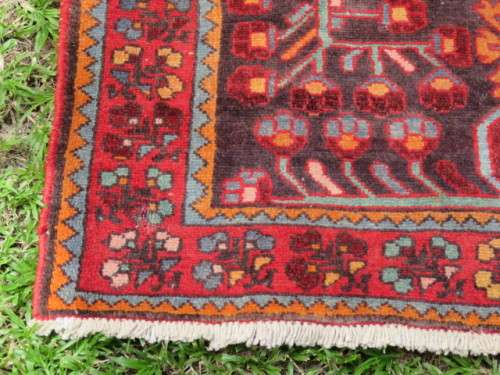 Hand knotted Persian runner.