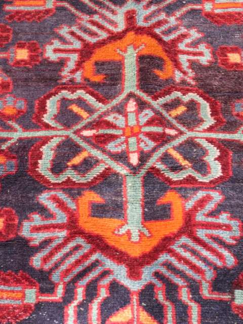 Hand knotted Persian runner.