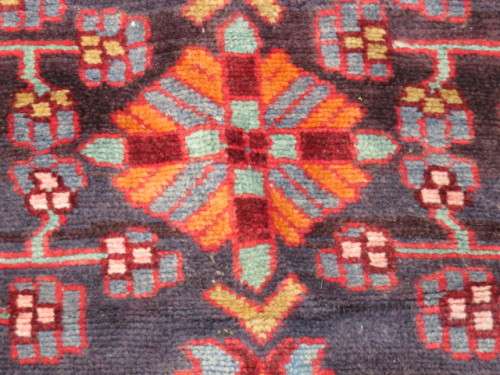 Hand knotted Persian runner.