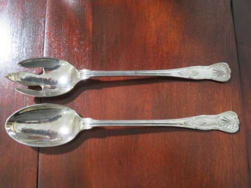 A pair of large EPNS King`s pattern salad servers.