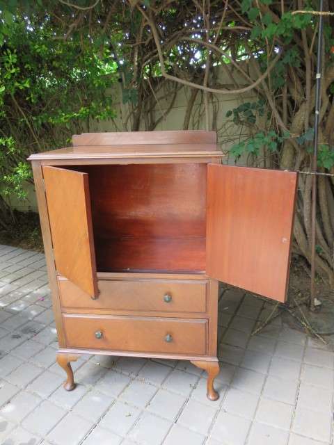 Vintage cabinet with drawers.