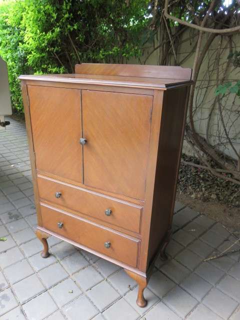 Vintage cabinet with drawers.