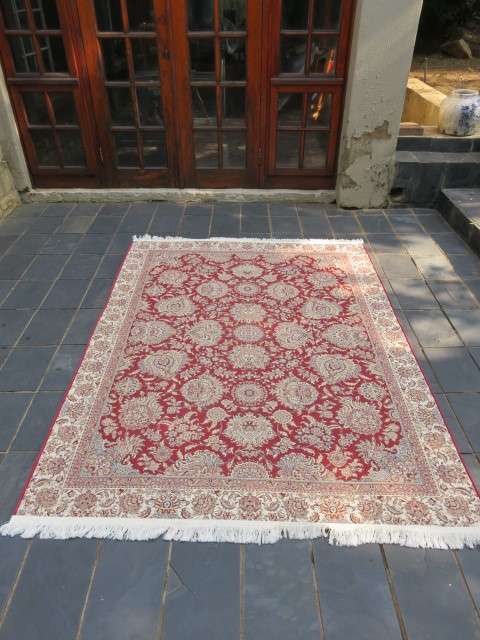 A Persian design Kelim carpet.