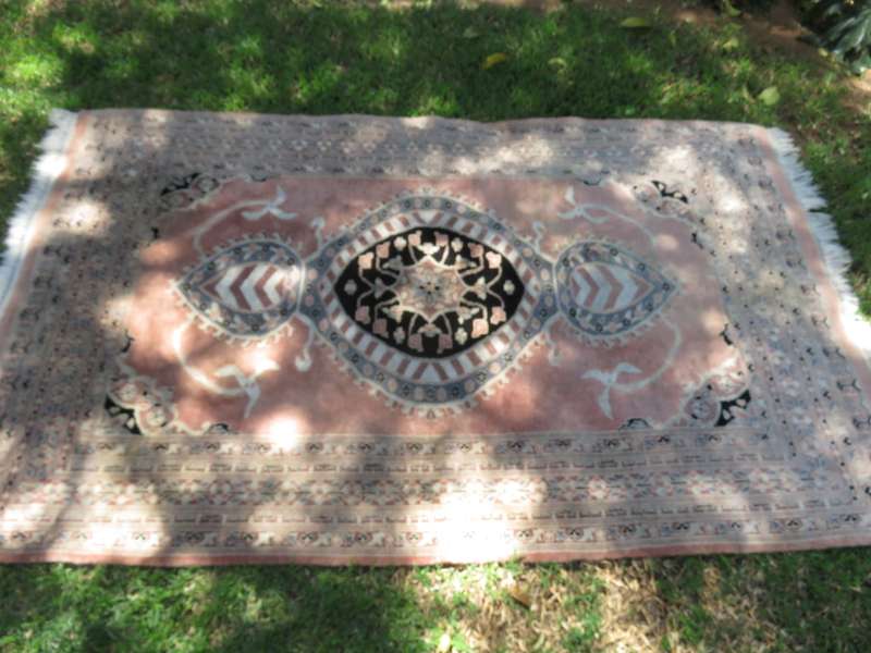 A hand knotted Jaipuri rug