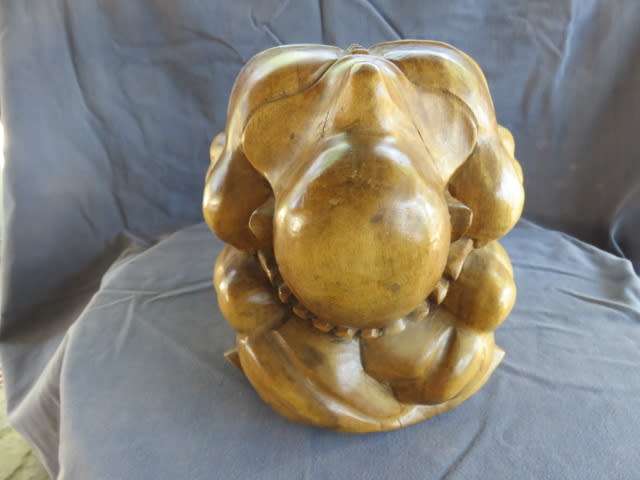 Carved wooden weeping buddha