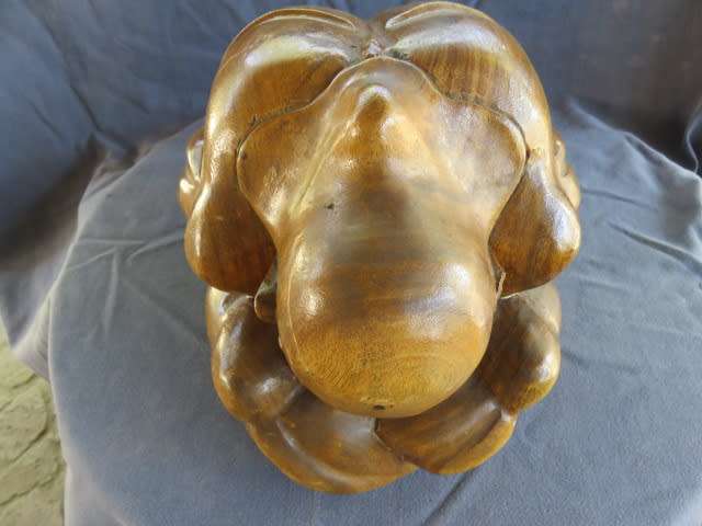 Carved wooden weeping buddha