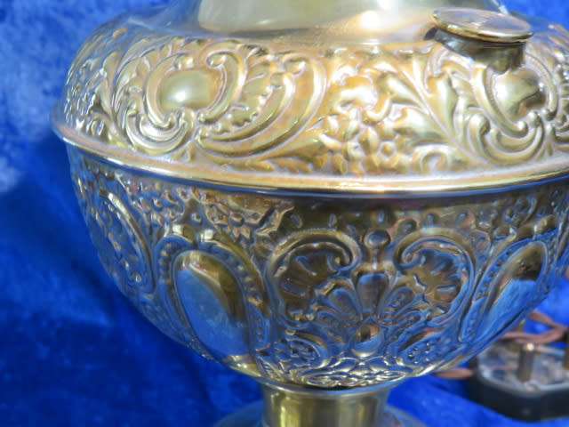 Victorian embossed brass electrified Millers paraffin lamp.
