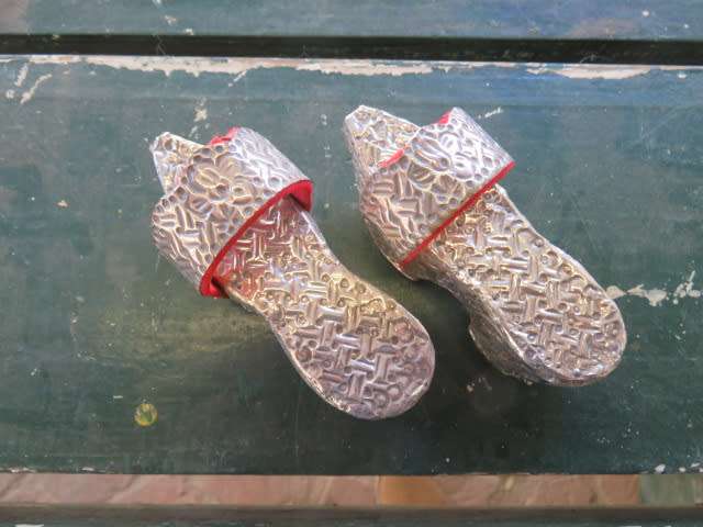 Pair of vintage Turkish wooden and silver overlaid clogs
