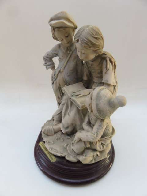 Guiseppe Armani figurine `Children reading book`