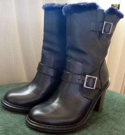 Dr. Martens black leather boots with faux fur trim and heels (worn once)