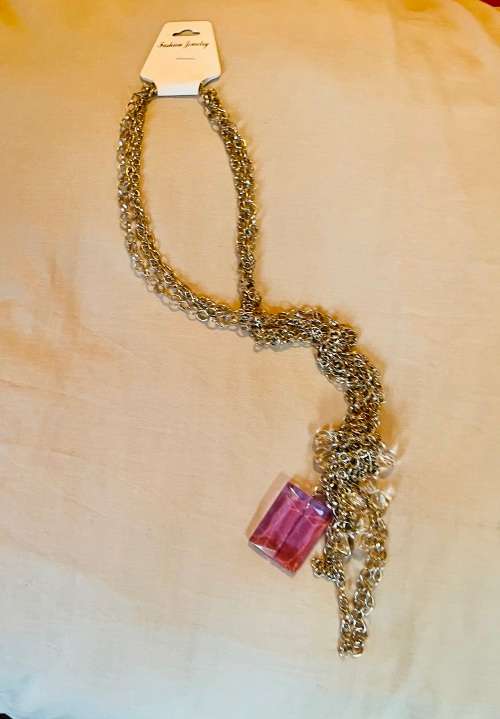 Silver knotted chain with diamanté detail and large purple stone