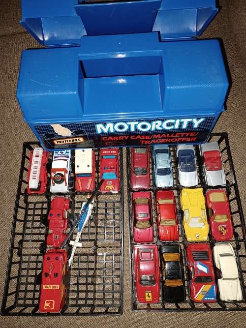 Matchbox Motorcity carry case and various cars