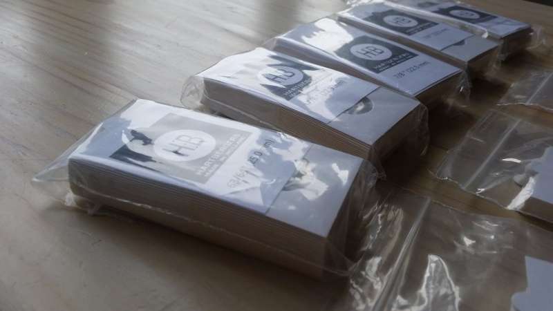 A large selection of Hartbergers self-adhesive coin flips (unused)