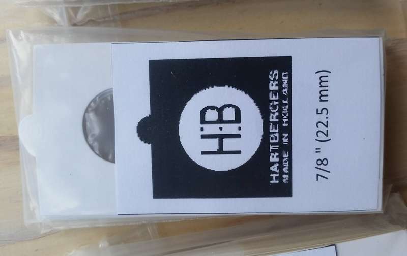 A large selection of Hartbergers self-adhesive coin flips (unused)