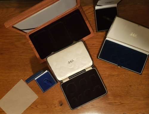 five coin display cases