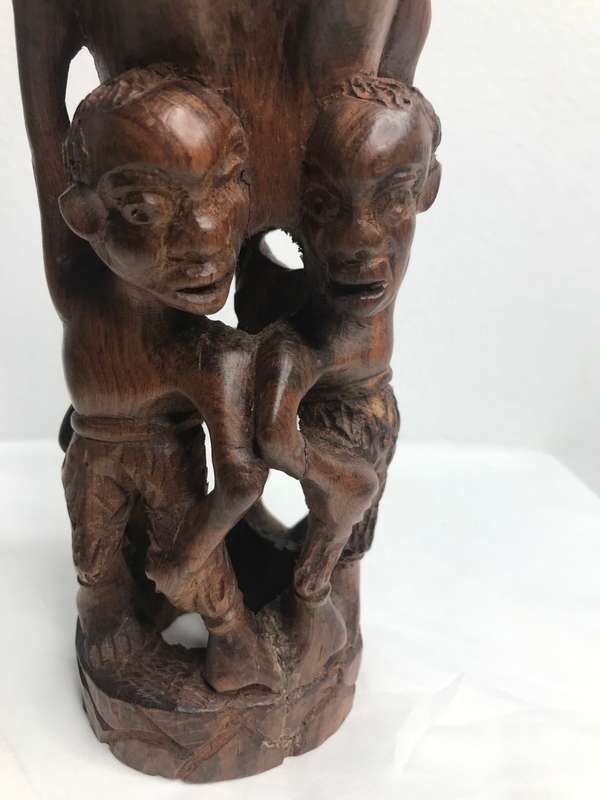Wood Art Hand Carved Sculpture in Ebony one Piece Family holding up a Hand 35cm x 10cm