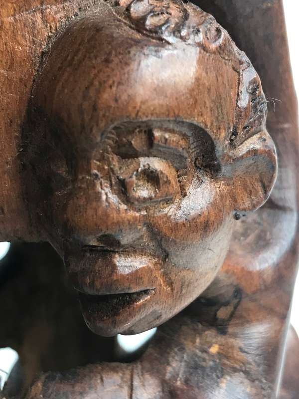 Wood Art Hand Carved Sculpture in Ebony one Piece Family holding up a Hand 35cm x 10cm