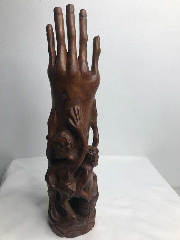 Wood Art Hand Carved Sculpture in Ebony one Piece Family holding up a Hand 35cm x 10cm