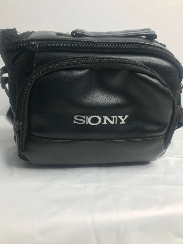 Sony Camera Bag Black Leather second hand front pocket, divider inside one zip off track