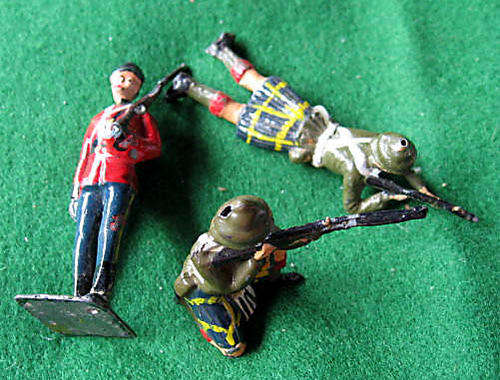 THREE DIE CAST SOLDIERS -MADE BY BRITAINS OF ENGLAND