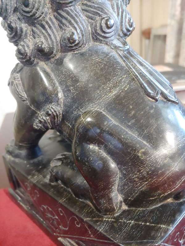 A pair of Antique Chinese Foo Dogs (Lions)