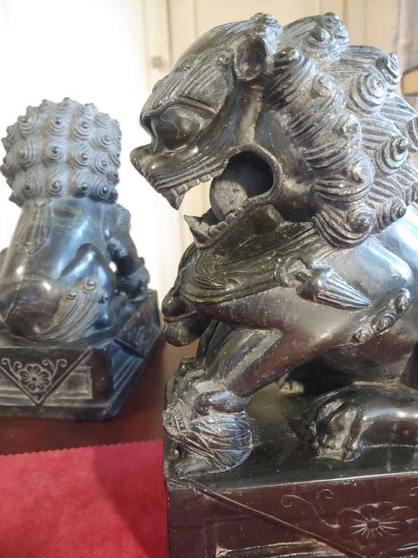 A pair of Antique Chinese Foo Dogs (Lions)