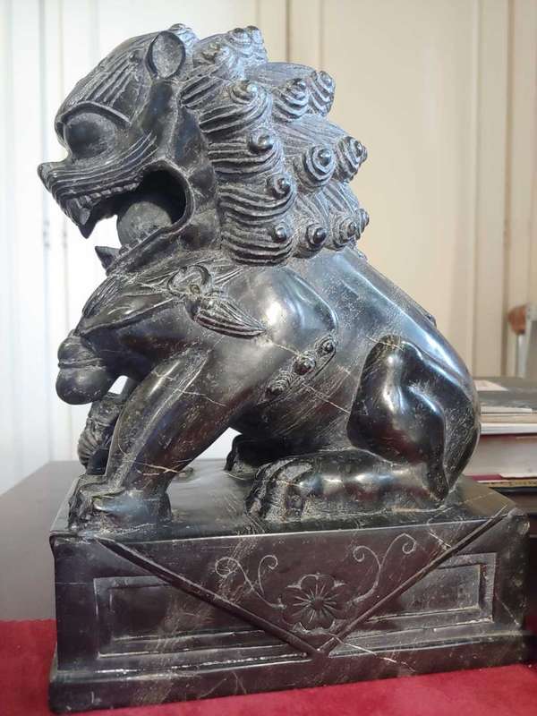 A pair of Antique Chinese Foo Dogs (Lions)